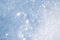 background with a texture of white blue snow on snowdrift on a cold sunny winter day Royalty Free Stock Photo