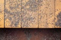 Texture of wooden boards with pieces of fine gravel