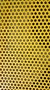 Background texture yellow iron board with round cuts through