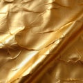 Background of textured gold paper exudes elegance and refinement