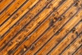 Background of textured lacquered wooden boards