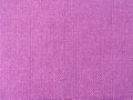 Background of textured purple rough fabric