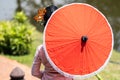 background of Thai traditional red umbrella in Lanna style, with unidentified local women in the northern region of Thailand Royalty Free Stock Photo