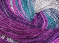 Background thread for knitting. Knitting pattern of colorful yarn wool.