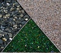 Background of three sections - green marbles, stones, and gravel Royalty Free Stock Photo