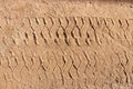 background of tire track mark in the sand Royalty Free Stock Photo