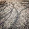 Background with tire tracks on the asphalt - vintage effect.