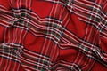 Background of traditional checkered christmas red fabric