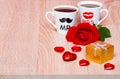 Background with two coffee cups, hearts, gift and rose flower Royalty Free Stock Photo