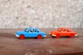 Two plastic cars Royalty Free Stock Photo