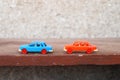 Two plastic cars Royalty Free Stock Photo