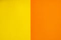 Background of two vertical rectangles yellow and orange. Sheets of blank yellow and orange paper with fine texture, split Royalty Free Stock Photo