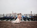 Venetian romantic couple masks masquerade in Venice italy