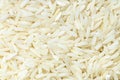 Background - uncooked polished long-grain rice Royalty Free Stock Photo