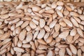 background with unpeeled almond kernels in shell on a bazaar counter close up Royalty Free Stock Photo