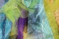 Background of a variety of beautiful colorful netting fabric - selective focus with bokeh