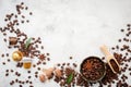 Background of various coffee , dark roasted coffee beans , ground and capsules with scoops setup on white concrete background with Royalty Free Stock Photo