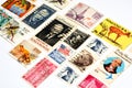 background of various old used postage stamps from different countries and times on a white background Royalty Free Stock Photo