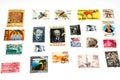 background of various old used postage stamps from different countries and times on a white background Royalty Free Stock Photo