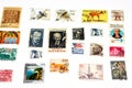 background of various old used postage stamps from different countries and times on a white background Royalty Free Stock Photo