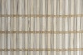 Background vertical bamboo wicker wall. Royalty Free Stock Photo