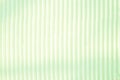 Geometrical background of light green yellow vertical parallel s
