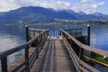 background view of a boat shed and yachts on the water on Lake Traunsee in the vicinity of Gmunden