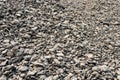 Background view: Heaps of bits and pieces of asphalt stones taken from demolished roads