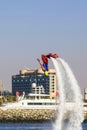 Background view man on flayborde doing Extreme stunt with a coup At competitions on extreme kinds of sports Royalty Free Stock Photo