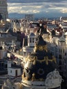 Background View of the rooftops of Madrid against the sky and clouds