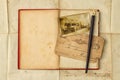 Background with vintage photo, postcards, and empty open book Royalty Free Stock Photo