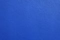 Background - wall with coarse blue roughcast finish