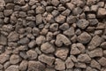 Background - wall composed of lumps of volcanic lava Royalty Free Stock Photo