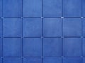 Background of wall  made of blue square tiles Royalty Free Stock Photo