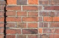 Background from a wall made of red brick with a small protrusion Royalty Free Stock Photo