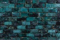 Background of a wall made of turquoise and black bricks Royalty Free Stock Photo