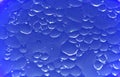 Background of water big and small drops. Smooth, reflection. Royalty Free Stock Photo