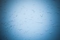 Background of water drop on a blue metallic surface Royalty Free Stock Photo