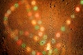 Background of water droplets and abstract lights Royalty Free Stock Photo