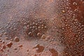 background of water drops on oily surface of iron sheet Royalty Free Stock Photo