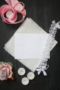 Background for wedding invitation with ribbons, candle, lace and vellum. Mock-up for calligraphy or lettering