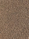 Background of wet sand with pores. Beach sand seamless pattern.