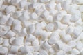 Background of white marshmallows, air souffles of small size. White sweets