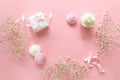 Background in white and pink colors with small baby`s-breath flowers gypsophila and copy space for text. Royalty Free Stock Photo