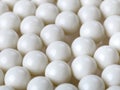 Background with white plastic airsoft balls