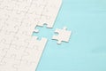 background of white puzzle with missing piece. Royalty Free Stock Photo