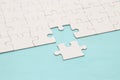 background of white puzzle with missing piece. Royalty Free Stock Photo