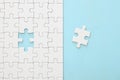 background of white puzzle with missing piece. Royalty Free Stock Photo