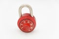 Red stainless steel lock on a white background