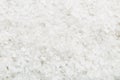 Background from white sea salt. Coarse rock salt texture witth copy space